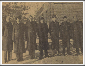 Copy of a newspaper clipping.  
Third from right is Larry Phelan.  Others are unknown.  If you have the original, please share with us.